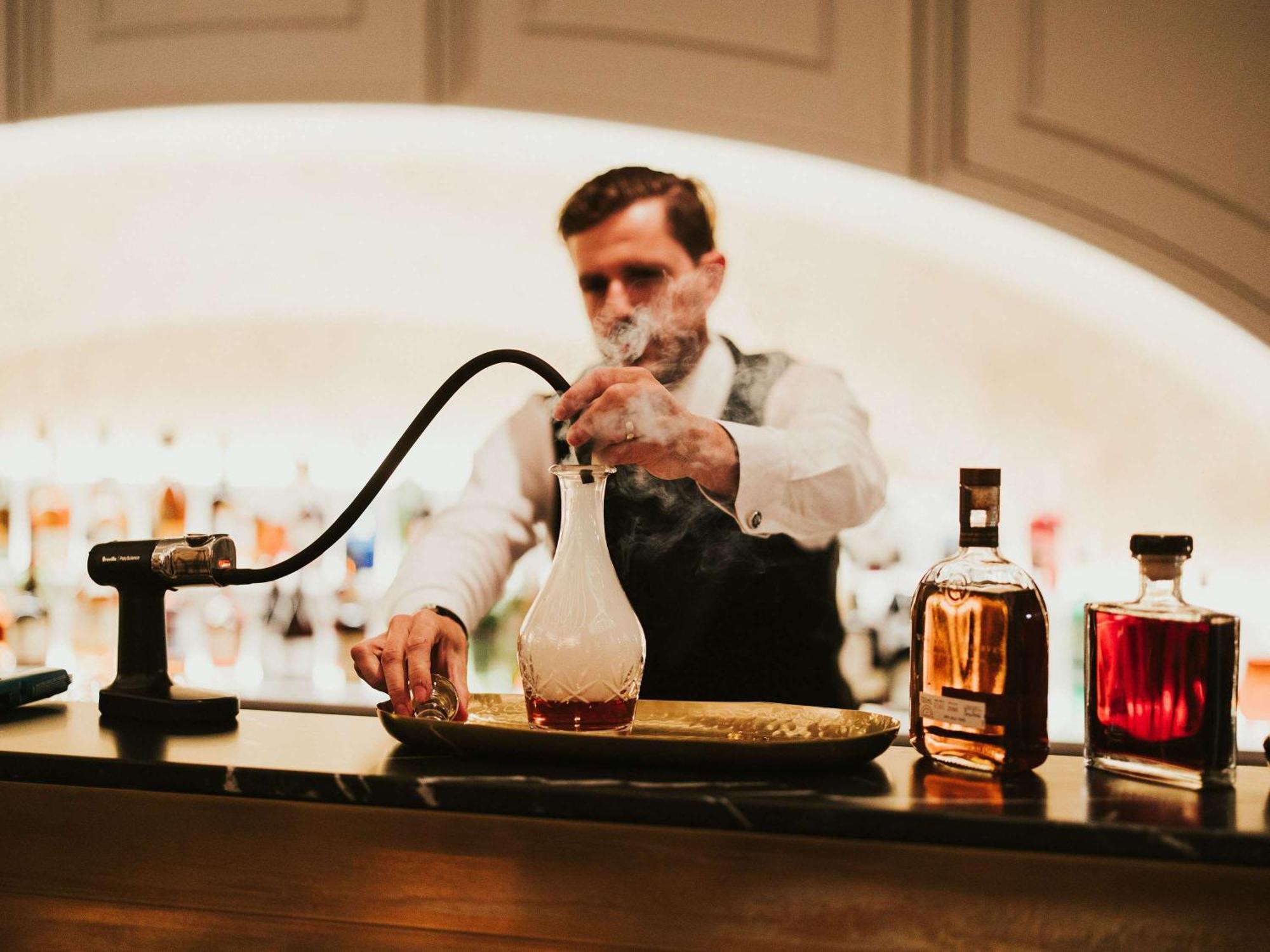 The Playford Adelaide - Mgallery Exterior photo A bartender at work
